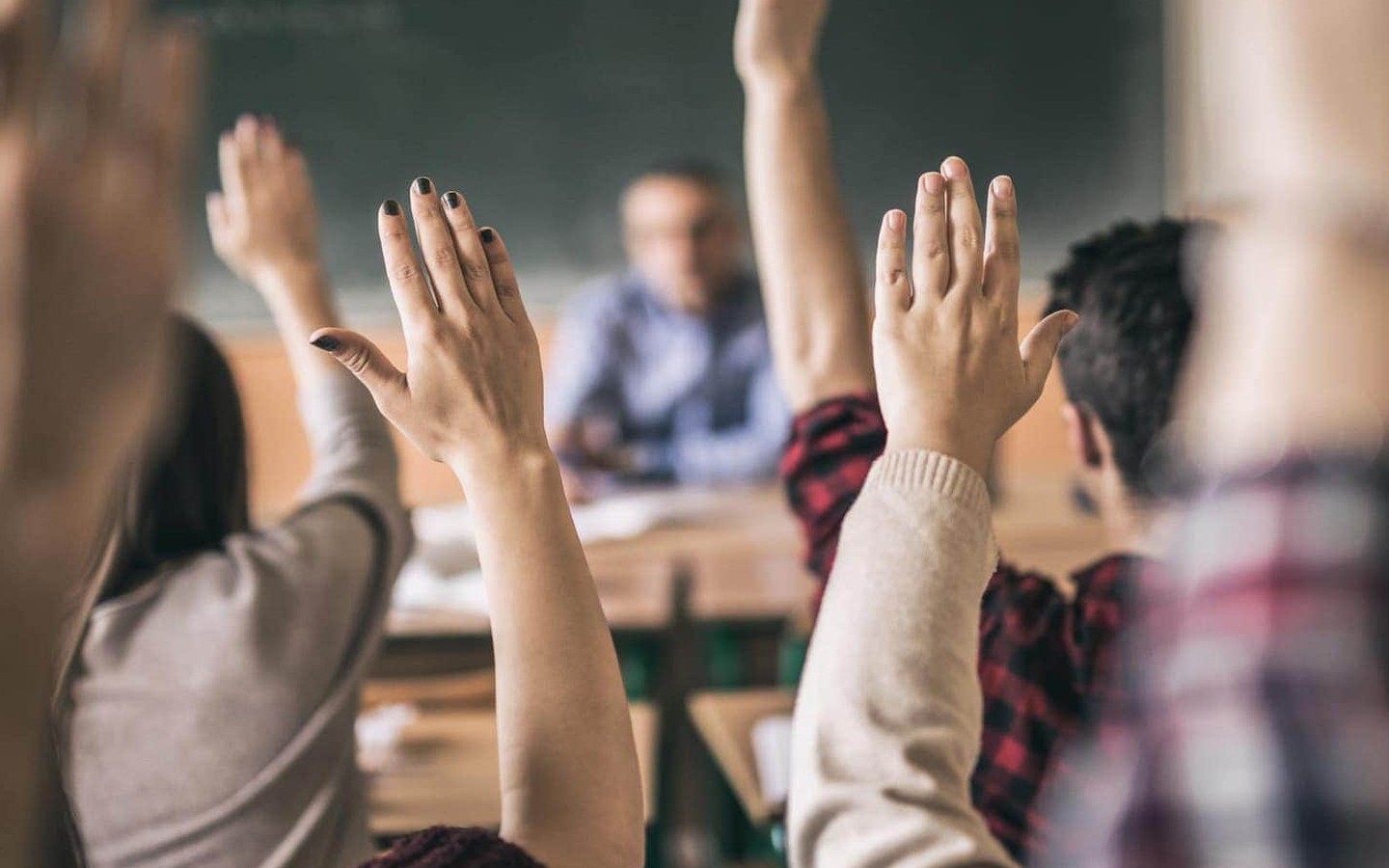 Web Students raising hands